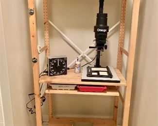$300 - Photography darkroom equipment (shelf included).  Included Omega enlarger, timer, trays and shelving -  70.5"H x 35"W x 20"D 