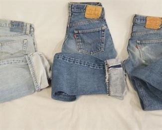 1027	LOT OF THREE PAIRS OF VINTAGE LEVIS 501 SELVEDGE JEANS. SIZES ARE 29 X 36, 29 X 34, LABEL IS MISSING ON ONE PAIR. VARYING DEGREES OF WEAR 
