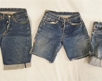 1029	LOT OF TWO PAIRS OF VINTAGE LEVI STRAUSS & COMPANY SELVEDGE SHORTS W/ BIG E & A PAIR OF SMALL CHILD SIZED SELVEDGE JEANS. VARYING DEGREES OF WEAR  

