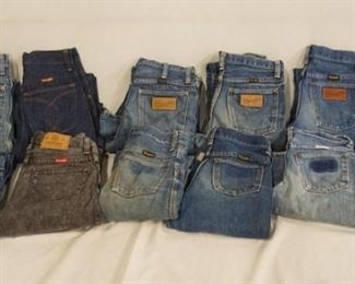 1031	LOT OF TWELVE PAIRS OF VINTAGE WRANGLER JEANS. SEVEN ARE YOUTH SIZE 14, FOUR ARE YOUTH SIZE 12 & ONE PAIR IS YOUTH SIZE 16.VARYING DEGREES OF WEAR 
