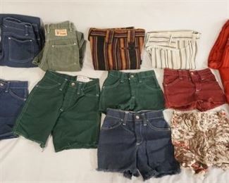1038	VINTAGE BILLY THE KID CLOTHING LOT, INCLUDES; SIX PAIRS OF SHORTS, MATCHING RED SHIRT & PANTS, PLUS FOUR PAIRS OF PANTS. VARYING DEGREES OF WEAR 
