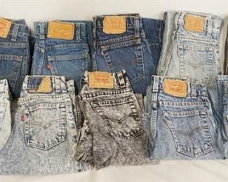 1041	LOT OF TEN PAIRS OF VINTAGE LEVI STRAUSS & COMPANY JEANS W/ RED TABS. ALL ARE YOUTH SIZE; FOUR ARE SIZE 12, TWO ARE SIZE 14, TWO ARE SIZE 10, ONE IS SIZE 11. & ONE PAIR SIZE IS ILLEGIBLE. VARYING DEGREES OF WEAR 

