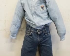 1048	BOY MANNEQUIN CLOTHED IN VINTAGE LEVIS JEANS, A DOCKERS LEVIS SHIRT, BANDANNA & AN OUTBACK TRADING COMPANY COWBOY HAT. HAS NO ARMS & HAS SOME LOSSES TO FACE.  APP. 58 IN TALL
