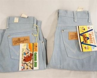 1051	TWO PAIRS OF VINTAGE WRANGLER SANFORIZED JEANS BOTH COME W/ COLORING/COMIC BOOKLETS WHICH ARE COPYRIGHT DATED 1959. ONE PAIR IS SIZE 13 THE OTHER IS SIZE 8 & HAS SOME STAINING TO THE FRONT
