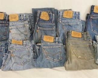 1065	LOT OF TEN PAIRS OF VINTAGE USA MADE LEVIS JEANS W/ ORANGE TABS ALL ARE YOUTH SIZES. SIZES ARE; THREE ARE SIZE 8, TWO ARE SIZE 9, THREE ARE SIZE 10 & TWO ARE SIZE 12. VARYING DEGREES OF WEAR 
