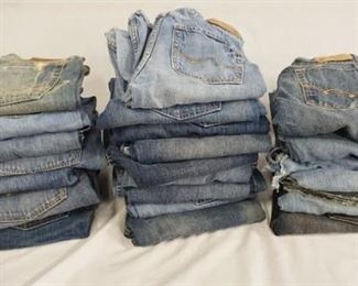 1073	LOT OF 24 PAIRS OF AMERICAN EAGLE JEANS. VARYING DEGREES OF WEAR 
