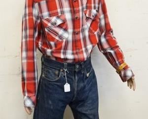 1101	BOY MANNEQUIN CLOTHED IN VINTAGE LEVIS SELVEDGE JEANS, SNEAKERS, CURRENT SHIRT, & COWBOY HAT. APP. 60 IN TALL. MANNEQUIN MAY SUFFER LOSSES TO BODY/FACE
