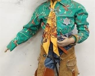 1108	YOU BOY MANNEQUIN CLOTHED IN VINTAGE LEVIS JEANS W/ BIG E, COWBOY BOOTS, CHAPS, BEADED BELT, VINTAGE STIR-UPS WESTER MADE SHIRT, *HAPPY COWBOY* ASCOT, LEE RIDER DEPUTY SHERIFF BADGE, & A HENSCHEL COWBOY HAT. APP. 40 IN TALL. MANNEQUIN MAY SUFFER LOSSES TO BODY/FACE
