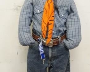 1109	YOUNG BOY  MANNEQUIN CLOTHED IN VINTAGE LEVIS JEANS, LEVIS SHIRT, SWAGGER  SCARF W/ WESTERN SCENE, BOOT HILL FEATHERED COWBOY HAT, BELT W/ BULLS HEAD BELT BUCKLE. APP. 45 IN TALL. MANNEQUIN MAY SUFFER LOSSES TO BODY/FACE
