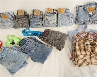 1115	LOT OF SMALL CHILD SIZED VINTAGE CLOTHING. LOT INCLUDES; A VINTAGE LEVIS DENIM JACKET SIZE 7, THREE VINTAGE SHIRTS, TWO ARE LEVIS ONE IS MONTGOMERY WARD & HAS A VINTAGE LEVIS PIN ON THE COLLAR & A MARSHAL BADGE. THREE PAIRS OF PANTS W/ SUSPENDERS- TWO ARE LEVIS SIZES 5 & 7, ONE IS LEE SIZE 8, & FIVE PAIRS OF LEVIS JEANS SIZES 6, 7, & THREE ARE SIZE FIVE. ONE PAIR IS DECORATED W/ BASEBALL/YANKEES RELATED PATCHES. VARYING DEGREES OF WEAR 
