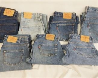 1117	LOT OF SEVEN PAIRS OF VINTAGE LEVIS JEANS ALL HAVE RED TABS. SIZES ARE; 36 X 29, 36 X 36, 33 X 32, 34 X 36, 36 X 33, & TWO ARE SIZE 32 X 32. VARYING DEGREES OF WEAR 
