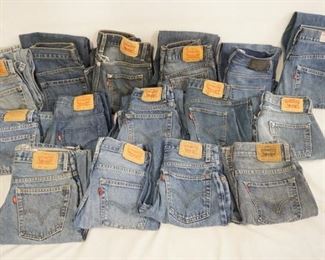 1121	LOT OF 15 PAIRS OF LEVIS JEANS. ALL ARE YOUTH SIZE 14. VARYING DEGREES OF WEAR 
