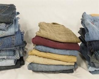 1123	LOT OF 24 PAIRS OF LEVIS JEANS W/ WAIST SIZES BETWEEN 26-30 IN. VARYING DEGREES OF WEAR 
