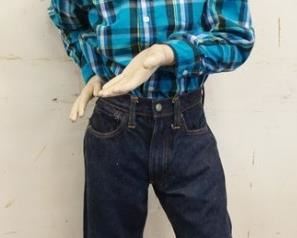 1142	BOY MANNEQUIN CLOTHED IN VINTAGE LEVIS SELVEDGE JEANS W/ BIG E, PRO KEDS SNEAKERS, WRANGLER SHIRT, BANDANNA, RELIGIOUS NECKLACE, WESTERN EXPRESS INC. COWBOY HAT. APP. 56 IN TALL. MANNEQUIN MAY SUFFER LOSSES TO BODY/FACE 

