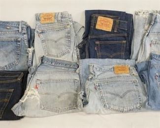 1148	LOT OF EIGHT PAIRS OF VINTAGE LEVIS JEANS ALL HAVE RED TABS. SIZES ARE; 30 X 32, 31 X 34, 34 X 30, 36 X 33, 28 X 30 & THREE PAIRS THE SIZES ARE UNKNOWN. VARYING DEGREES OF WEAR 
