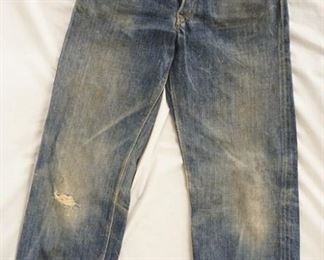 1149	VINTAGE LEVIS SELVEDGE  CINCHBACK JEANS. APPEAR TO BE FROM THE EARLY 1930S, WITH THE SUSPENDER BUTTONS BEING PREVIOUSLY REMOVED (SEE PHOTOS) WAIST MEASURES APP. 25 IN, INSEAM APP. 27 1/4 IN
