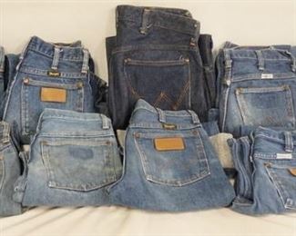 1153	LOT OF NINE PAIRS OF VINTAGE WRANGLER JEANS. FOUR ARE SIZE 27 X 32, THREE ARE SIZE 27 X 30, ONE IS SIZE 30 X 32 & ONE IS SIZE 32 X 32. VARYING DEGREES OF WEAR 
