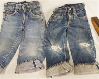 1163	LOT OF TWO VINTAGE LEVIS SELVEDGE JEANS (BOTH ARE SMALL YOUTH SIZED) & A BELT W/ A LEVIS BELT BUCKLE. VARYING DEGREES OF WEAR 
