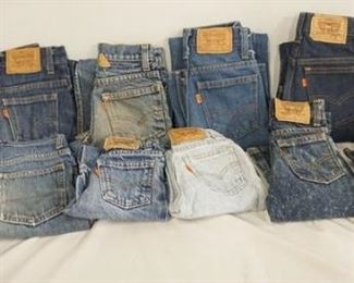 1174	LOT OF 12 PAIRS OF VINTAGE LEVIS JEANS, INCLUDING A PAIR OF BELL BOTTOMS (YOUTH SIZE 14) ALL ARE YOUTH SIZES. VARYING DEGREES OF WEAR. 

