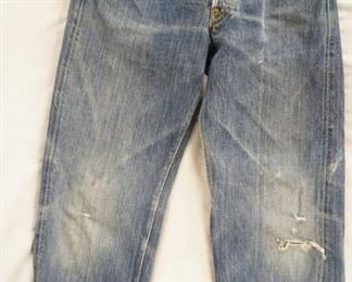 1179	VINTAGE LEVIS CINCH BACK SELVEDGE JEANS. APPEAR TO BE FROM THE EARLY 1930S WAIST MEASURES APP. 26 IN IN SEAM APP. 25 IN 
