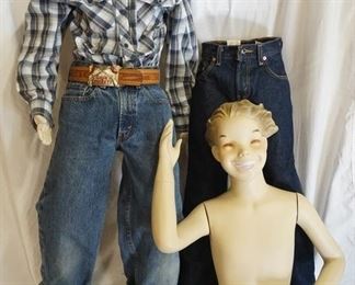 1189	LOT OF TWO MANNEQUINS; ONE IS PLUSH & IS HEADLESS IT IS WEARING LEVIS JEANS W/ A DAVEY CROCKET BELT & BELT BUCKLE, & AN OLD NAVY SHIRT. THE OTHER MANNEQUIN IS BROKEN WHERE THE TORSO & LEGS ATTACH & IS CLOTHED IN LEVIS JEANS 
