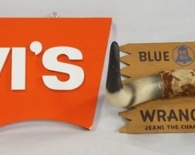 1194	LOT OF TWO VINTAGE JEANS HANGING ADVERTISING SIGNS LEVIS & WRANGLER. LEVIS SIGN MEASURES; 30 X 14 IN, THE WRANGLER SIGN MEASURES; 17 1/2 IN X 11 1/2 IN 
