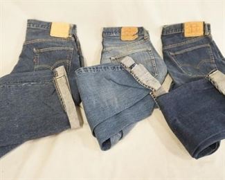 1197	LOT OF THREE PAIRS OF VINTAGE LEVIS SELVEDGE JEANS W/ BIG E. ONE PAIR IS SIZE 36 X 34 & NO NUMBER IS VISIBLE ON REVERSE OF TOP BUTTON, ONE IS SIZE 36 X 32 THE REVERSE OF TOP BUTTON IS STAMPED 8, & ONE IS SIZE 34 X 31 THE REVERSE OF TOP BUTTON IS STAMPED 6. VARYING DEGREES OF WEAR 
