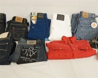 1200	LOT OF MISC. CLOTHING INLUDING SIX PAIRS OF LEVIS JEANS, A PAIR OF OLD NAVY JEANS, A DOCKERS SHIRT, A BANDANNA & A PAIR OF TEAM NFL SNEAKERS. VARYING DEGREES OF WEAR 
