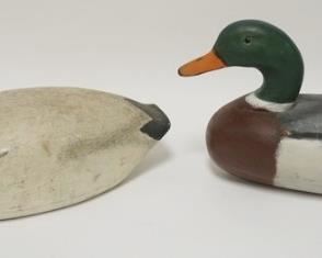 1003	2 CARVED WOOD DUCK DECOYS, LARGEST IS 16 IN X 8 1/4 IN
