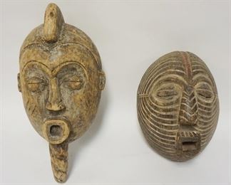 1006	LOT OF 2 ETHNIC WOOD CARVED MASKS, 17 IN X 7 IN
