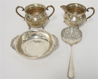 1064	4 PIECES OF STERLING SILVER, SMALL BOWL, CREAMER, SUGAR & SLOTTED SPOON, 9.71 TOZ TOTAL
