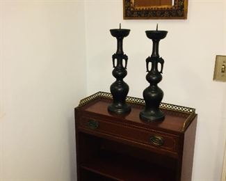 vintage chest with antique mirror and large candle sticks