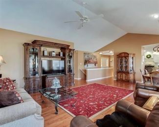 Entertainment center detaches to two shelving units and center piece could hold TV, use as coffee bar, etc.
