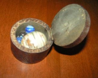 wood box of marbles