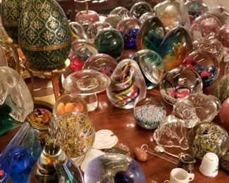 Collection of paper weights and other collectible items..