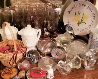 Collection of paper weights and other collectible items..