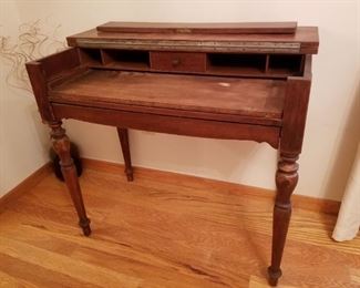 Antique desk with lift up/fold back top