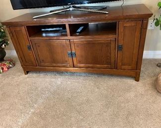 $225- Entertainment center- 
The tv cabinet is 20 inches wide, 5 ft long, & 30 inches high.