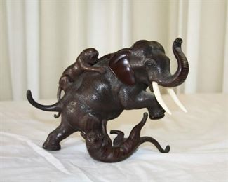 early 20th century Japanese bronze sculpture - Tigers attacking Elephant 14" x 9 1/2" tall - asking $725. 