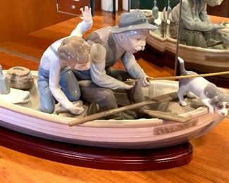 Lladro Figurine; "Fishing with Gramps" (5215). Designed in 1984 by Jose Puche. Measures 8.75" x 15.25"
