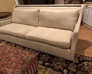 CR Laine sofa beautifully accented with upholstery tacks