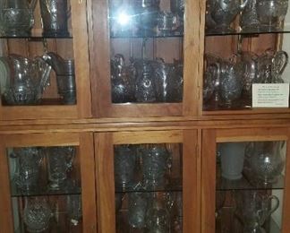 Large collection early American Pressed Glass water pitchers
