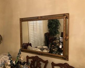 Large mirror in gold frame