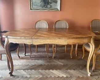LOT #110 - $600 - John Widdicomb Dining Table w/ 2 Leaves & Eight Chairs, there are 4 captain's chairs & 4 side chairs (table approx.  67" L x 45.5" W x 29.5" H with one leaf inserted)