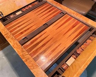 LOT #118 - $1,600 - Burl Wood Combination Backgammon Table & Desk, top rotates over to reveal game table, stabilizing pin needs repair (approx. 40.75" L x 30.75" W x 28" H).  If you are seriously interested in this piece, you will need to inspect the item before purchase.  
