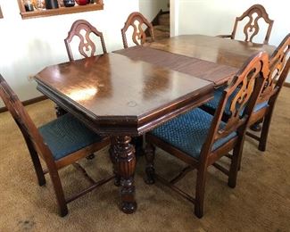 Antique dining table and 6 chairs 