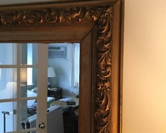plaster on wood framed mirror