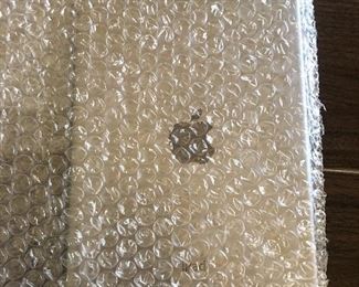 Brand new iPad with accessories ( and bubble wrap)