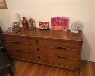 Dresser with some items on it