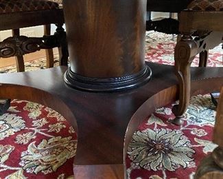 Beautiful pedestal and claw feet on dining table.